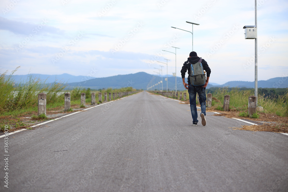 Obraz premium Man walking on road in Rayong, Thailand