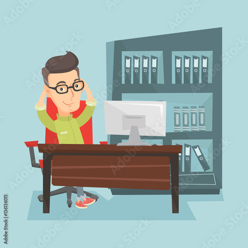 Satisfied business man relaxing in office.