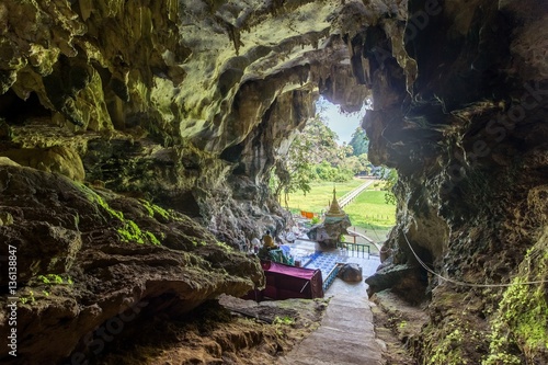 Inside Buddhist cave in Myanmar photo