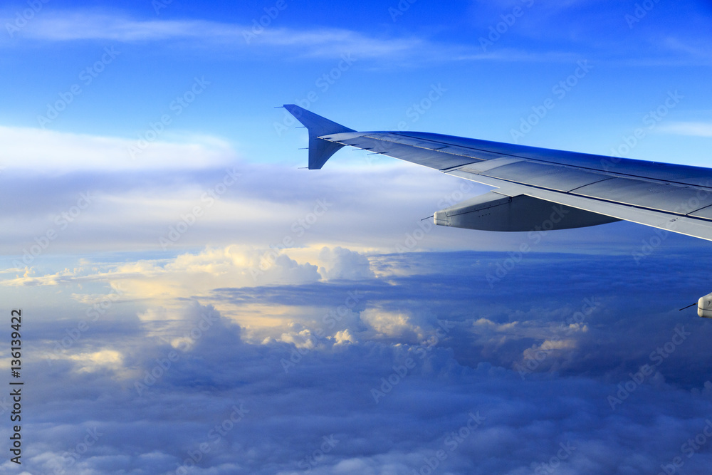 Obraz premium Skyline View above the Clouds from air plane
