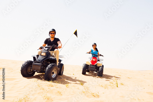 Tourists Riding Quad Bikes