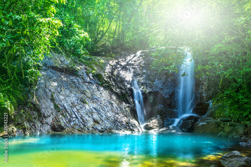 Fototapeta Naklejka Na Ścianę i Meble -  Tropical waterfall in the forest,Ton Chong Fa  in khao lak Phang