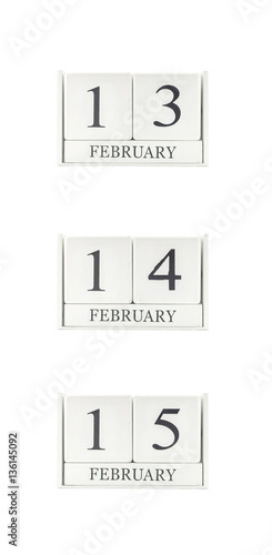 Closeup group of white wooden calendar with black 13 , 14 , 15 february word , three date calendar isolated on white background