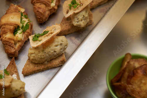 Breakfast menu food frame with close up view.Fresh tasty croissants on an wooden kitchen table.