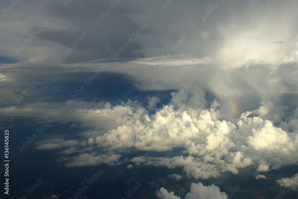 Aerial view of clouds and skywith  as seen through window of an