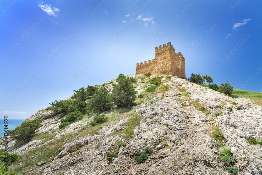 Genoese fortress view from below, the bright daytime photo fortr