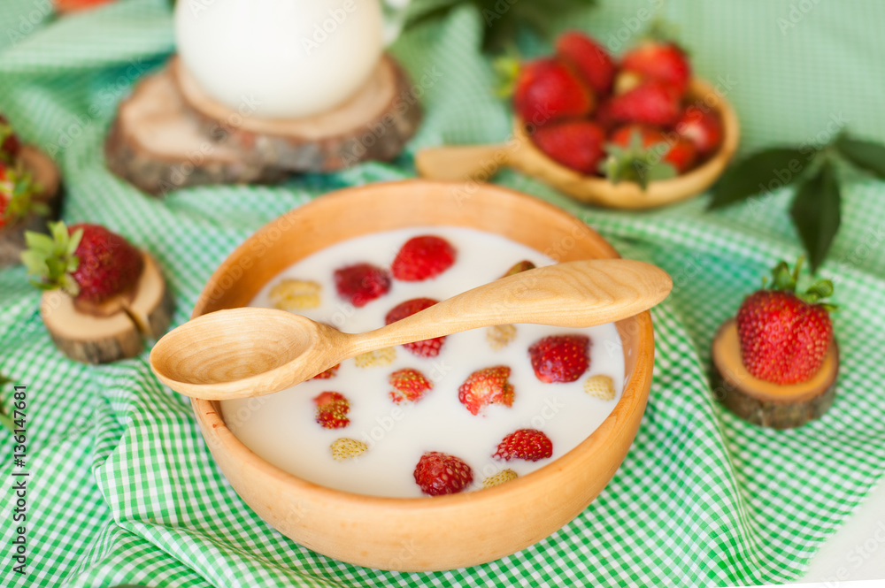 spoon, milk and stawberries