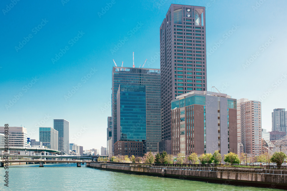OSAKA, JAPAN, MARCH 27: Kyu-Yodo River and skyscrapers of downto