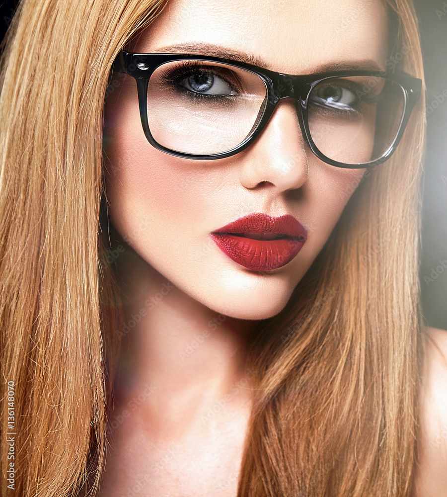 sensual glamour portrait of beautiful blond woman model with fresh daily makeup with purple lips color and clean healthy skin in glasses sensual glamour portrait of beautiful blond woman model with fresh daily makeup with purple lips color and clean healthy skin in glasses