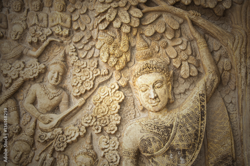 Low-relief image of beautiful woman in the north of temple of Thailand, no copyright Low-relief image of beautiful woman in the north of temple of Thailand, no copyright