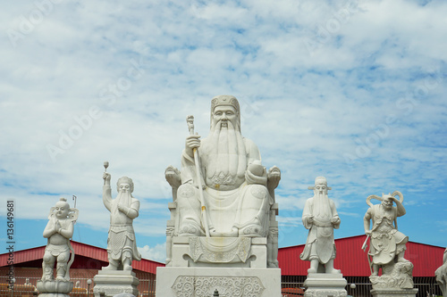 Chinese god statues in Chinese temple,Perak Malaysia with blue sky background