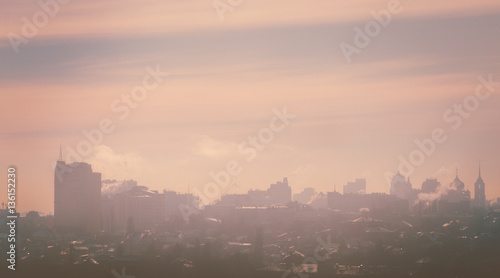 Foggy winter morning. Fog over the town. Cityscape. Morning fog.