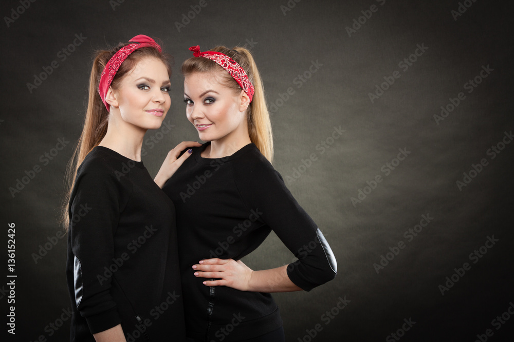Loving sisters in retro pin up stylization. Loving sisters in retro pin up stylization.