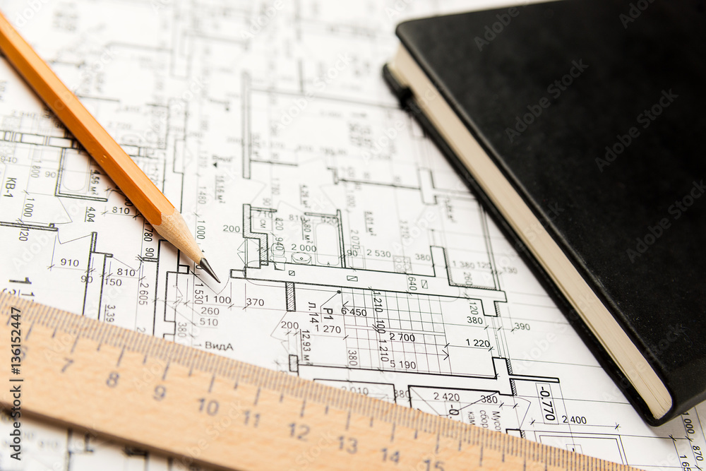 On the sheet of the drawing is a pencil with Notepad On the sheet of the drawing is a pencil with Notepad