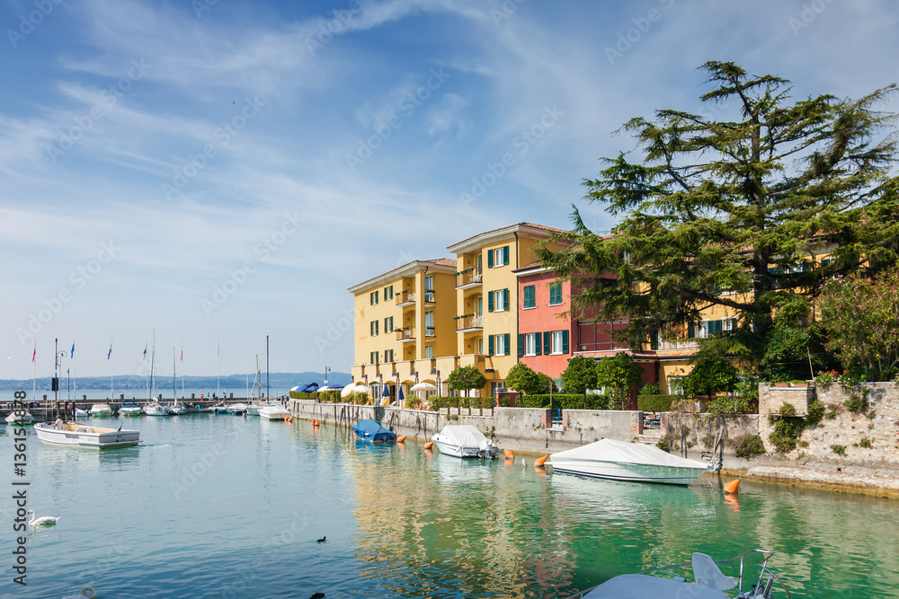 Sunny view of town Sirmione at Garda lake, Lombardia region, Italy. Sunny view of town Sirmione at Garda lake, Lombardia region, Italy.