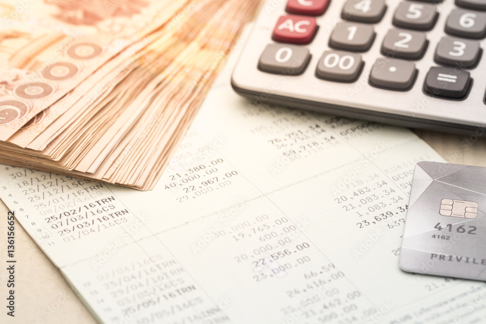 Passbook and calculator,finance and banking concept Passbook and calculator,finance and banking concept