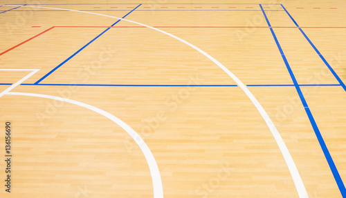 wooden floor volleyball, basketball, badminton court with light effect Wooden floor of sports hall with marking lines line on wooden floor indoor, gym court