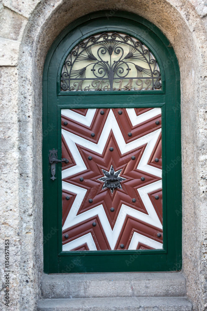 Wooden door in old town of Salzburg. Austria Wooden door in old town of Salzburg. Austria