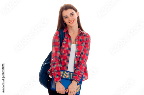 portrait of young cheerful student girl with backpack and folders for notebooks isolated on white background