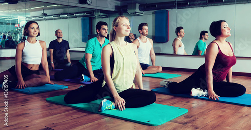 Positive people practicing yoga