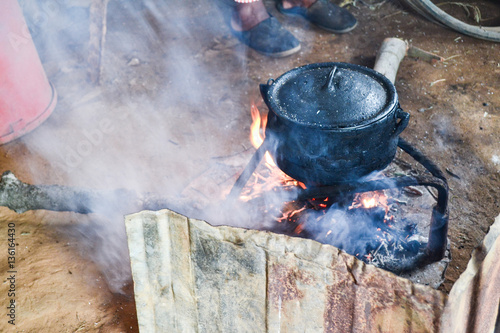 Cooking traditional african corn porridge