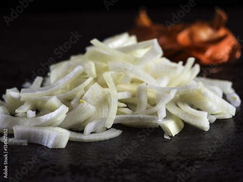 slised onion on stone