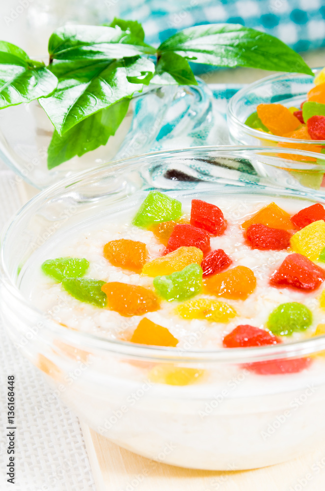 Oatmeal with colorful candied fruits Oatmeal with colorful candied fruits