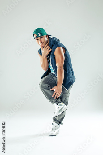 Man break dancer on white studio background