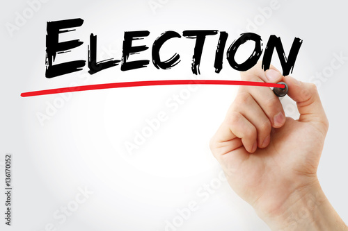 Hand writing Election with marker, concept background photo