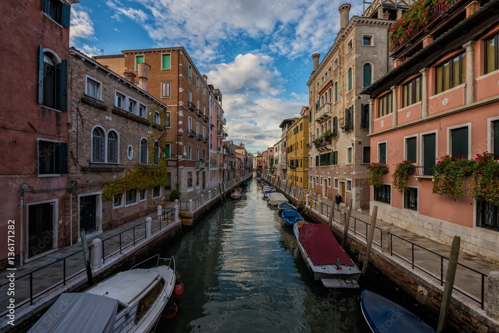 VENICE, ITALY – SEPTEMBER 18: Venice city in Italy. Canals, buildings and boats. Travel (vacation) concept. On September 18 in Venice, Italy