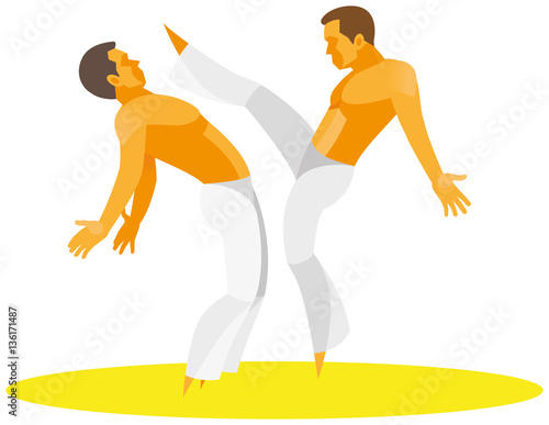 Two young athletes engaged in the Brazilian national martial art