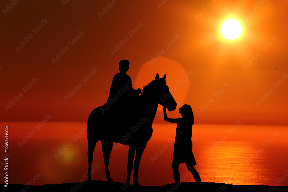 silhouette of a man sitting on a horse standing next to a girl on the background of a beautiful sunset