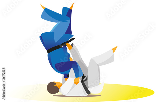 Judo fighter throws the opponent over himself lying on his back