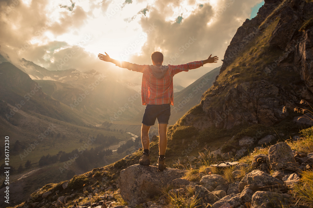 Fototapeta premium Man Traveler hiking Travel Lifestyle concept beautiful mountains landscape on background Summer journey adventure vacations outdoor