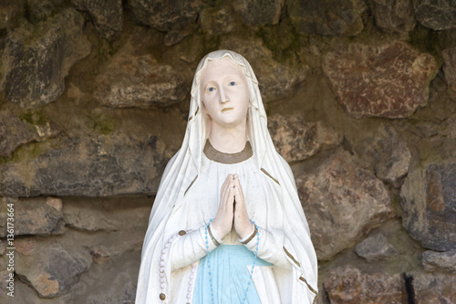 Canvas Print The statue of Our Lady of Lourdes (Notre Dame de Lourdes in French) - Holy Mary