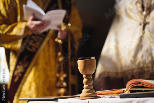 Wooden chalice with sacramental wine