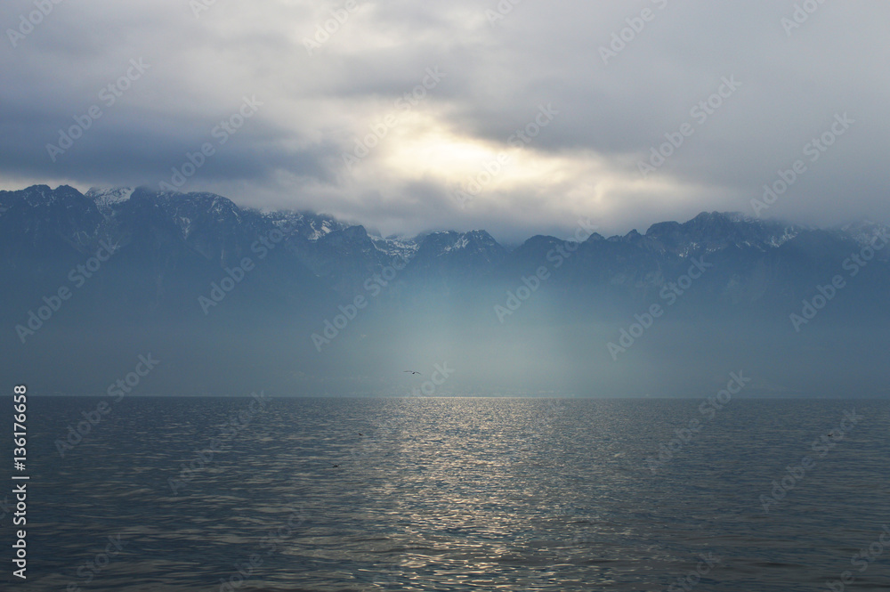 Mountains and lake in cloudy weather