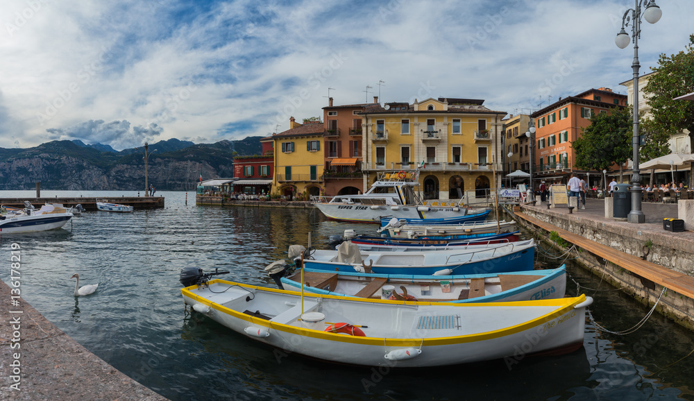 MALCESINE, ITALY – SEPTEMBER 16: Malcesine on Garda Lake, Italy. Buildings and boats in the harbor. On September 17 in Malcesine, Italy