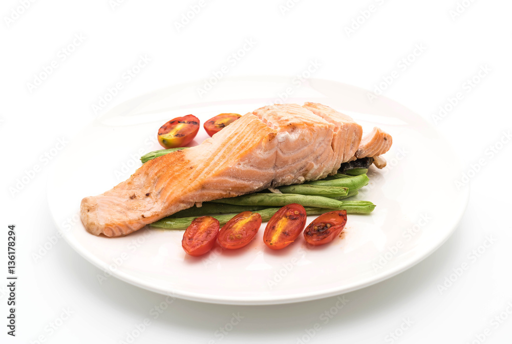 grilled salmon steak on white