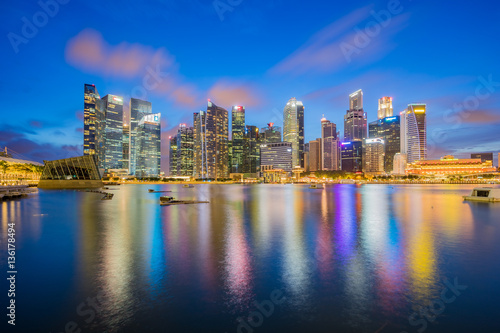 Singapore city skyline at night by Marina bay