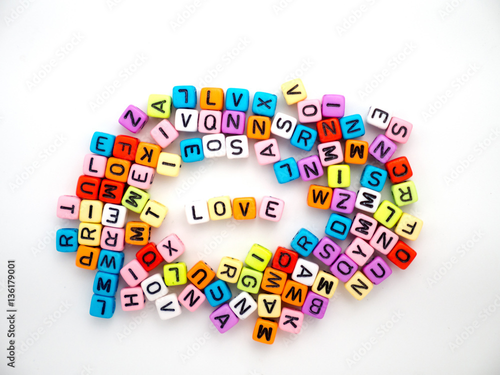 Letters spelling 'Love' on a white background.