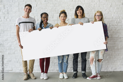 Group of Friends Holding Blank Banner photo