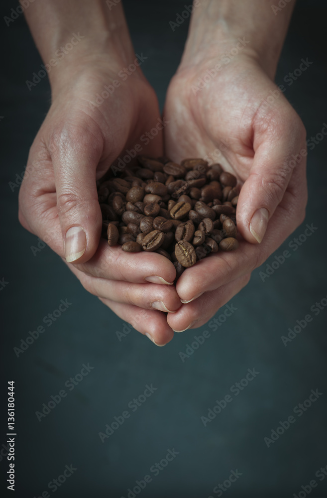 Coffee cup and saucer on a wooden table. Dark background. Coffee cup and saucer on a wooden table. Dark background.