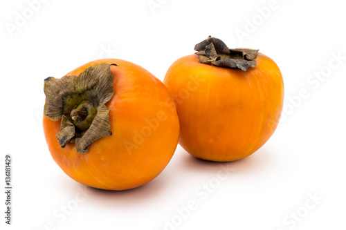 two ripe persimmon close up