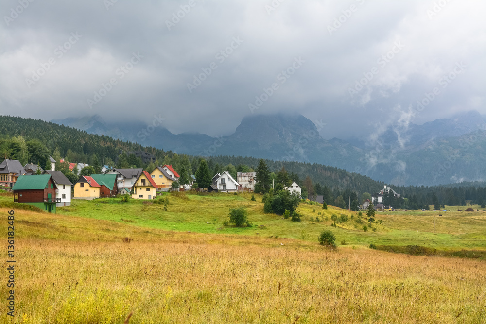 Picturesque landscape of the village on a background of mountains