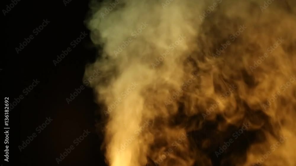 Yellow and green vapor/smoke on black background Yellow and green vapor/smoke on black background