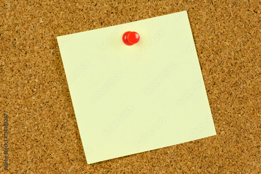 Post it note on cork board Post it note on cork board