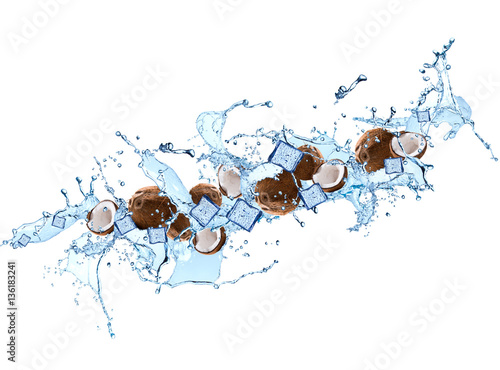 Splash with coconut isolated on white background. Abstract water with fresh fruits. 