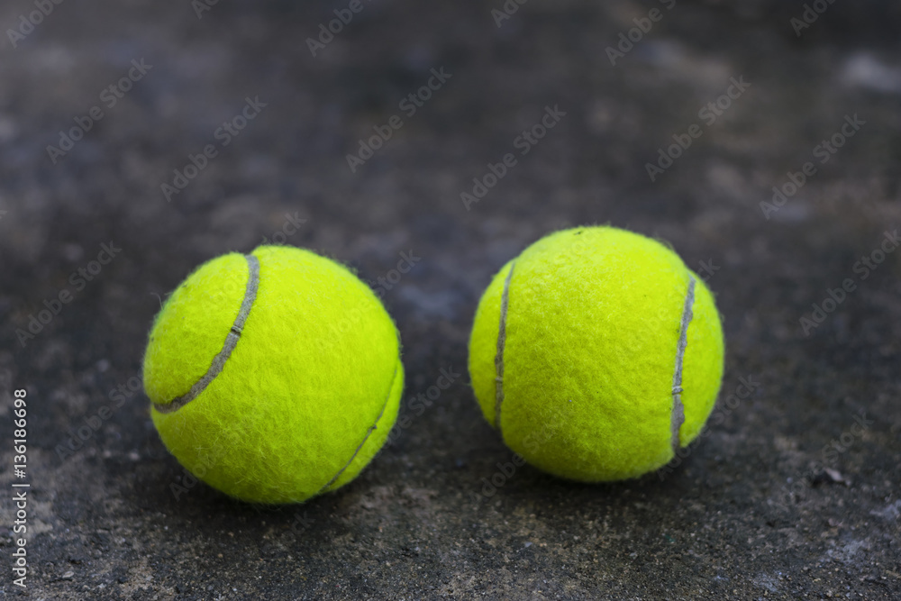 Tennis ball on the ground