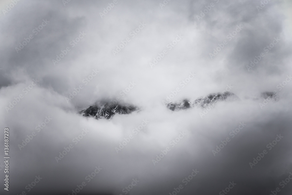 Dense clouds with two openings for natural background. Toned Dense clouds with two openings for natural background. Toned